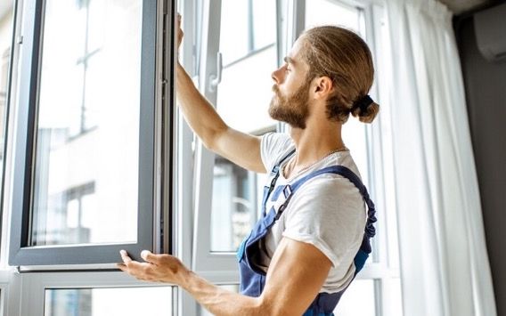 New energy-efficient replacement window being installed